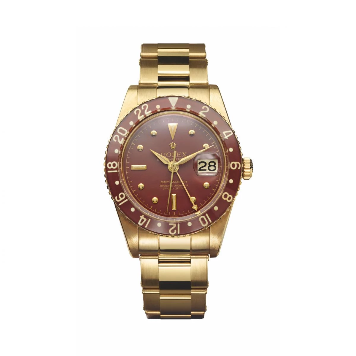 GMT-Master II，18K黃金，棕色塑膠玻璃字圈，1957年，型號6542。