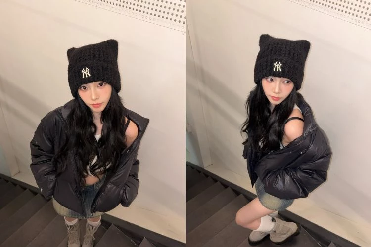 這一套Karina則換上黑色羽絨外套，整體風格明顯更偏向冷調街頭感。