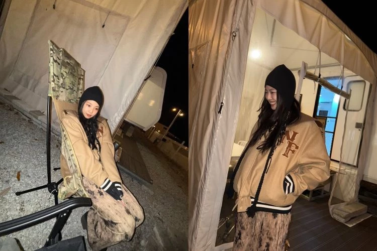 這一套毛帽穿搭走的是貼合頭型、拉長縱向比例的路線。Jennie選擇偏窄、包覆度高的毛帽款式，完整貼住頭部輪廓，讓視線自然往下延伸，不會在額頭或兩側產生膨脹感。