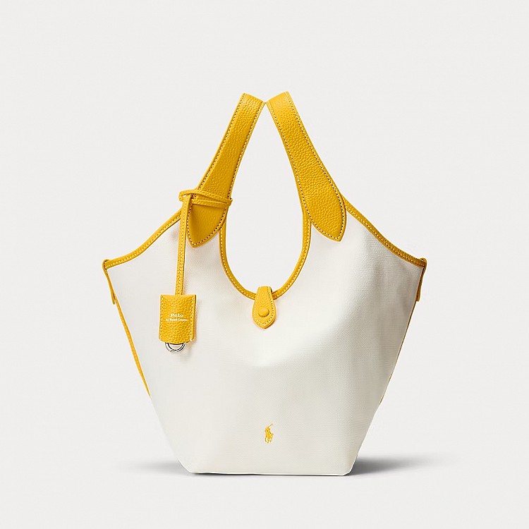 Winter同款在這裡!曾經在社群上曬出這款來自Polo Ralph Lauren的「Polo Play」皮革包款,這裡我們推薦一個更有少女感的帆布款托特包,運用帆布材質點綴上檸檬黃的色彩,非常青春、非常有少女氣息!