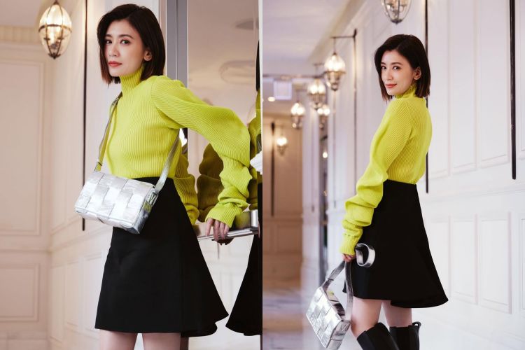 帶有螢光萊姆黃的高領針織作為視覺主角，鮮明但不刺眼的色調直接點亮氣色，也讓短髮輪廓更俐落精緻。