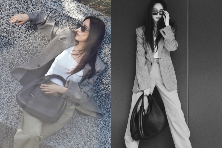 柯佳嬿以西裝套裝內搭白色坦克背心現身街頭，極簡灰搭配橄欖綠的配色勾勒出俐落線條，微露胸口讓比例更修長，同時散發自在自信的魅力。