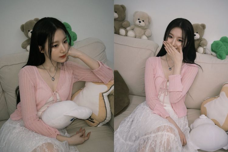 舒華這套穿搭把「軟糯系美感」發揮到極致。粉色細針織小外套本身帶微透光澤，拉出若隱若現的鎖骨線條，加上綁帶設計讓比例更顯纖細。