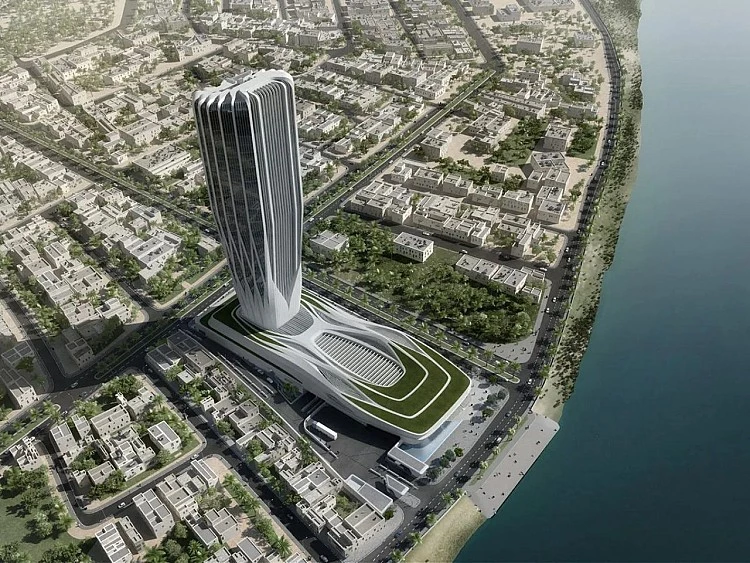 伊拉克中央銀行的新總部,對札哈・哈蒂(Zaha Hadid)而言,是一場帶著苦澀意味的「返鄉」。這是這位已故英籍伊拉克裔建築師,在家鄉首都巴格達(Baghdad)唯一落成的建築。儘管她親自主持了最初於 2011 年公布的設計,卻在五年後英年早逝,未能等到工程動土。如今,這座高樓拔地而起,宛如一只香檳杯,改寫天際線,極具震撼力。