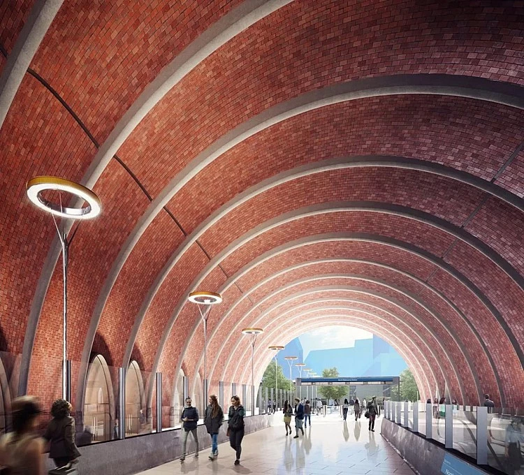 墨爾本 40 年來規模最大的鐵路系統升級工程——地鐵隧道計畫(Metro Tunnel),是一項重要的工程壯舉。這個歷時 10 年、斥資 135 億澳元(約 2,852 億新台幣)的計畫,透過兩條平行、全長 5.6 英里的隧道,串聯多條既有地鐵線路。各車站旨在與地面街道建立視覺連結:靠近地表的車站設有寬敞入口與天窗,讓自然光灑滿站廳,被形容為一座「大教堂」。