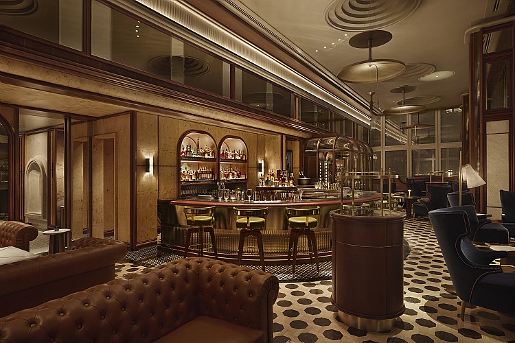 二樓 Cooper 以職人匠心精神，融合深藍絲絨與黃銅點綴的氛圍，在靜謐氛圍中細品經典與陳年風味