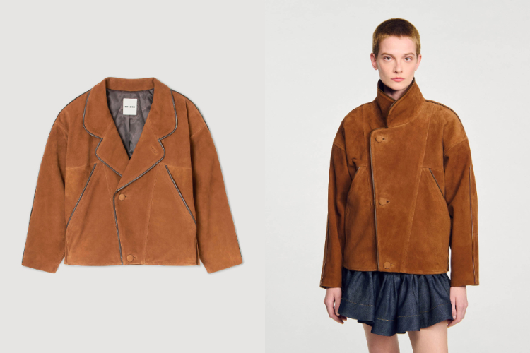 Oversized版型配上存在感十足的大翻領，柔軟麂皮自帶霧面光澤，搭配對比色滾邊勾勒線條，層次與態度一次到位。