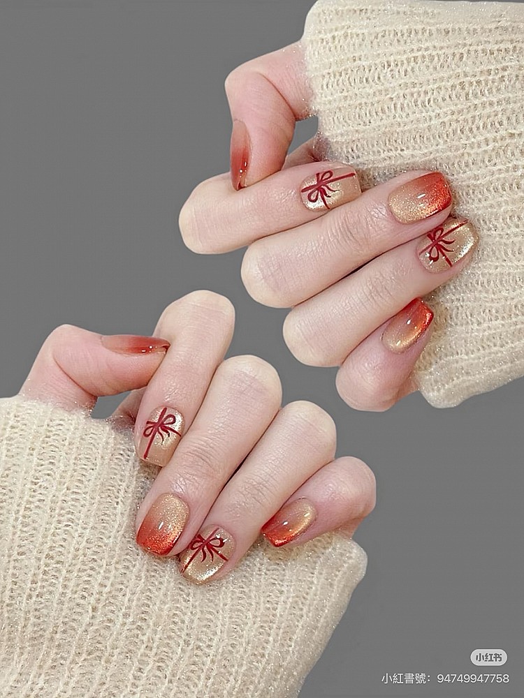 聖誕光療美甲推薦10:紅色貓眼緞帶