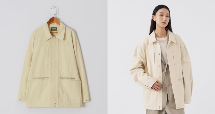 來自台灣的服裝品牌Mouggan，推出這款米杏色工裝外套，門襟採用隱藏式壓釦設計，讓正面線條更乾淨俐落。