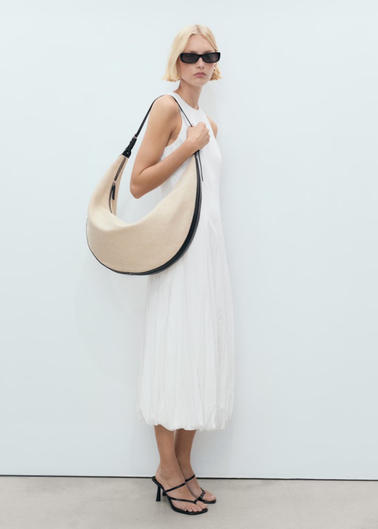 度假感的亞麻洋裝是夏日必備,天然纖維帶來輕盈透氣感,搭配草編帽或草編包,即刻營造海島氛圍。