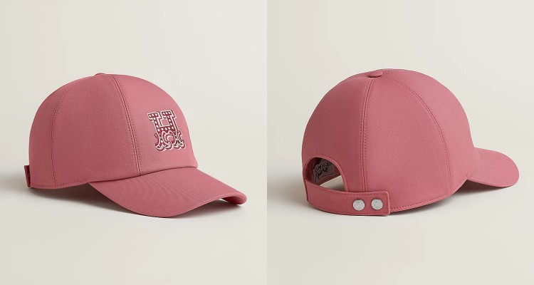 以防潑水斜紋棉質打造，搭配真絲與棉質內裡，展現舒適與奢華質感。正面立體刺繡的H字母低調卻搶眼，為整體造型注入品牌辨識度。