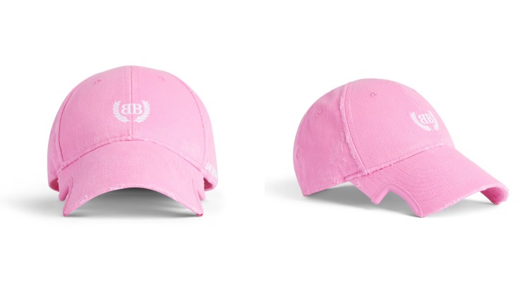 這頂Balenciaga粉色棒球帽以活力色調瞬間抓住目光，展現街頭時尚的俏麗態度。採用純棉布製成，刻意做舊與毛邊細節，營造率性不羈的氛圍。
