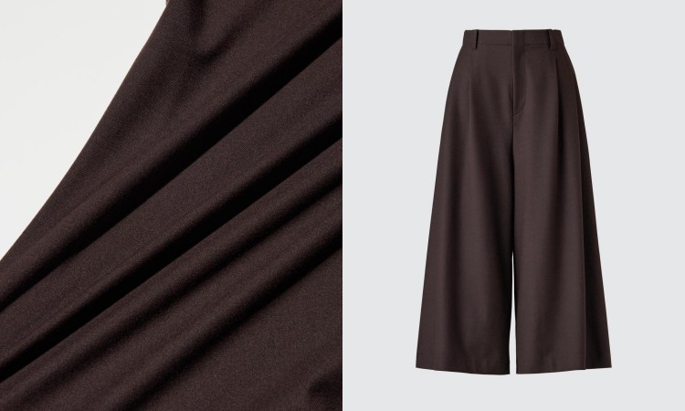 這款寬褲選用高彈性的2WAY機能布料，具備優異的延展性，能順應身體律動自然拉伸。