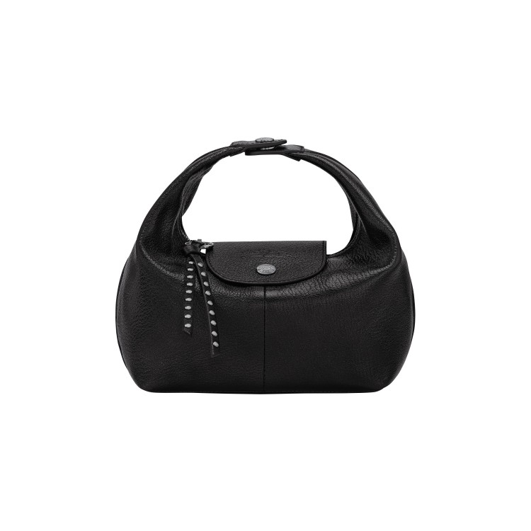 來自Longchamp Le Pliage系列的黑色手提包，以柔軟皮革重新詮釋經典輪廓。