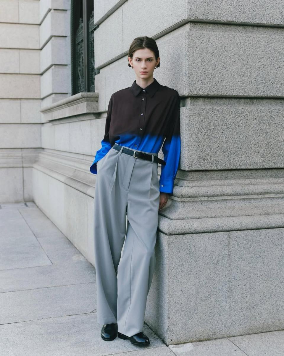 淺色會放大、深色會收縮，把淺色放在上半身、深色在下半身，視覺重心自然下降，看起來更勻稱。