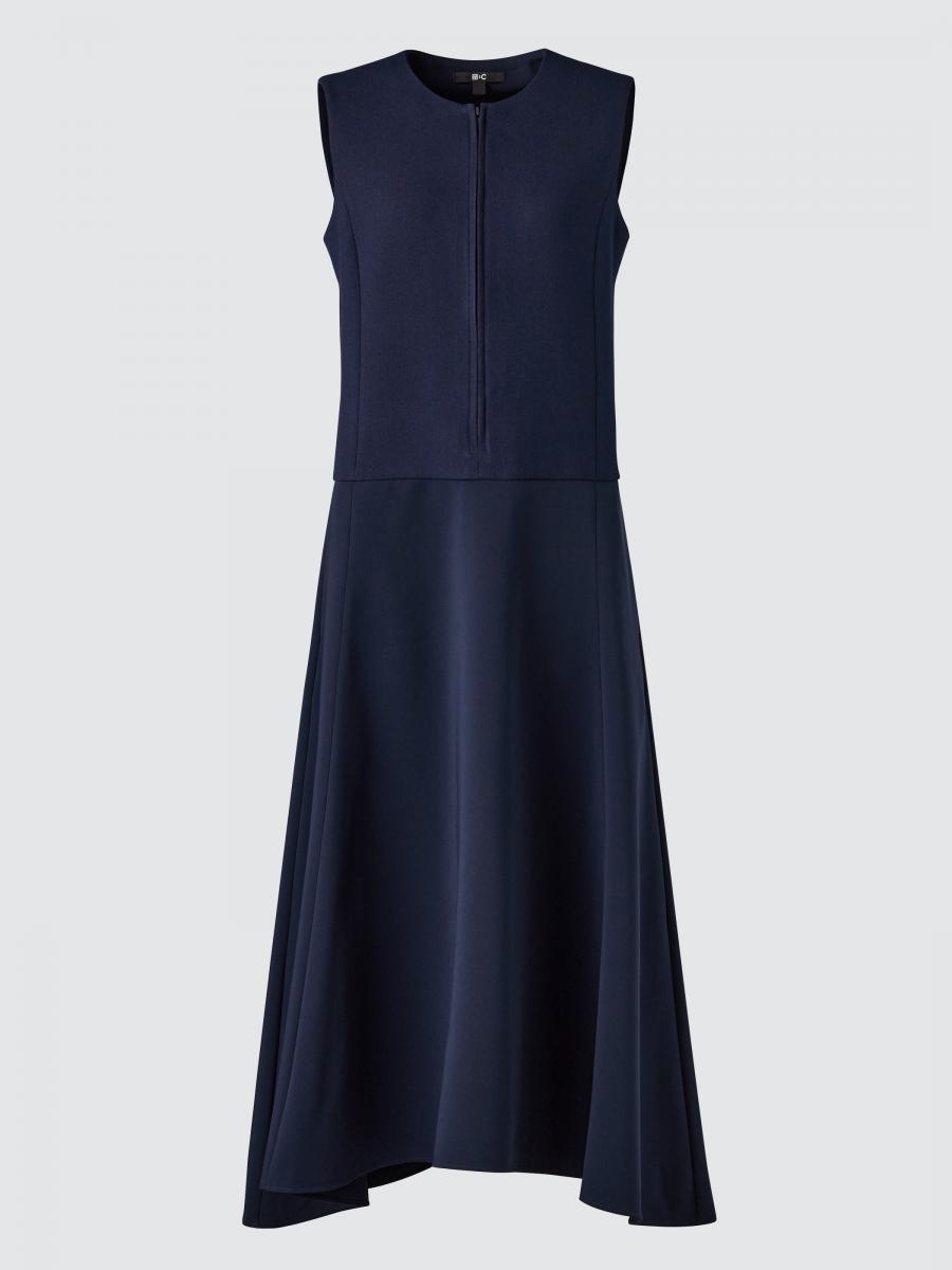 連身長洋裝是懶人穿搭的好幫手！這一款無袖洋裝以簡潔的線條呈現，下擺微微的 A 字剪裁可修飾線條，上身的開襟拉鍊設計，則能讓女性著裝時能有更多變化。