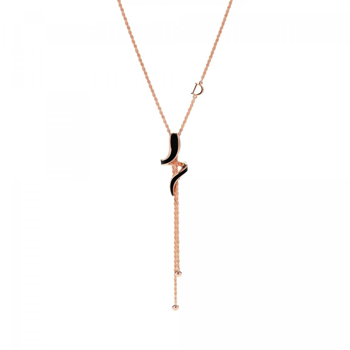 Damiani 的 Eden 系列，宛如夜色中的蛇影，蜿蜒、神秘、充滿誘惑。黑色陶瓷與18K玫瑰金結合，勾勒出蛇形曲線，佩戴時就像是有一縷低語在耳邊盤旋。