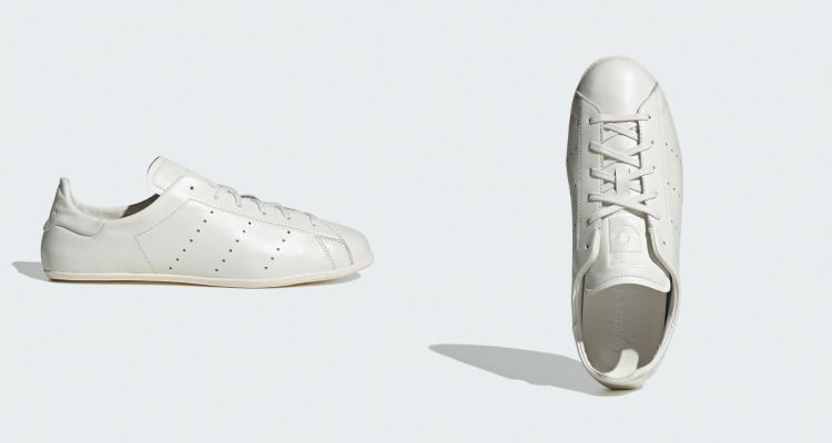 來自adidas Stan Smith系列的白色運動鞋，鞋面選用細緻皮革打造，側邊以打孔排列呼應標誌性的三條線設計，讓呼吸感與辨識度兼具。