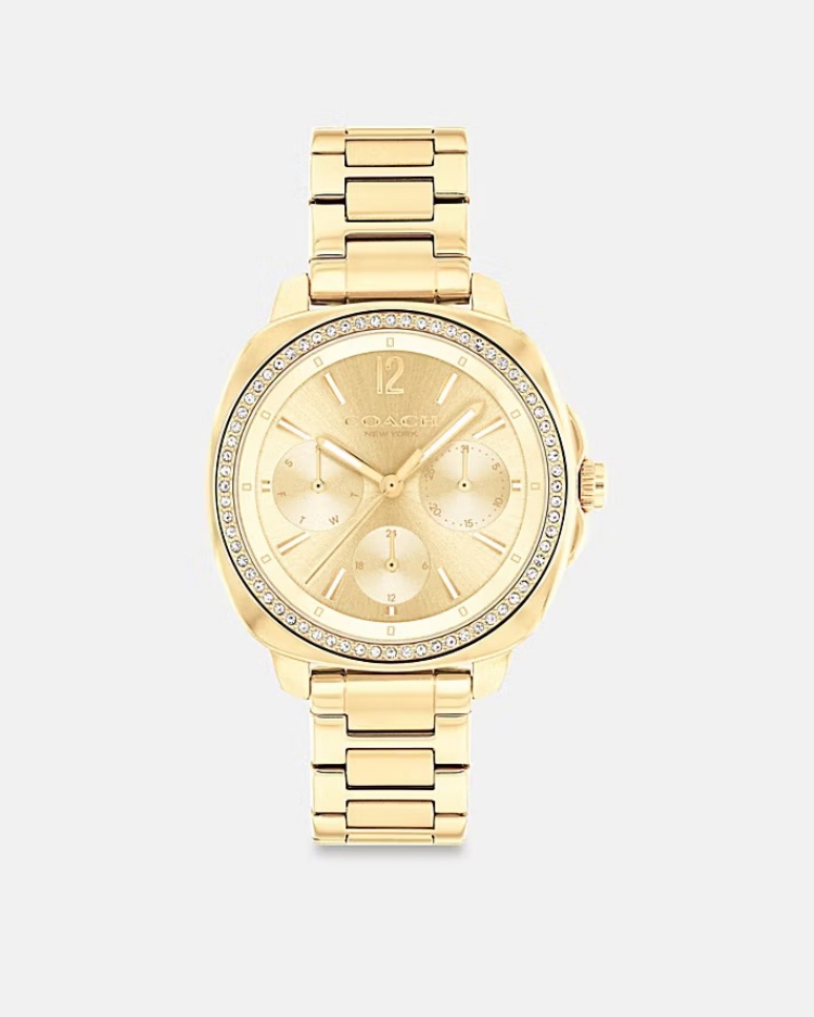 如果說其他款是配件，那 Kitt 就是一款「專業感」十足的時尚工具錶。三眼設計搭配計時功能，不僅實用，更展現幹練氣勢。金色錶身在光線下閃耀細膩光澤，日光紋錶盤則增添層次感。