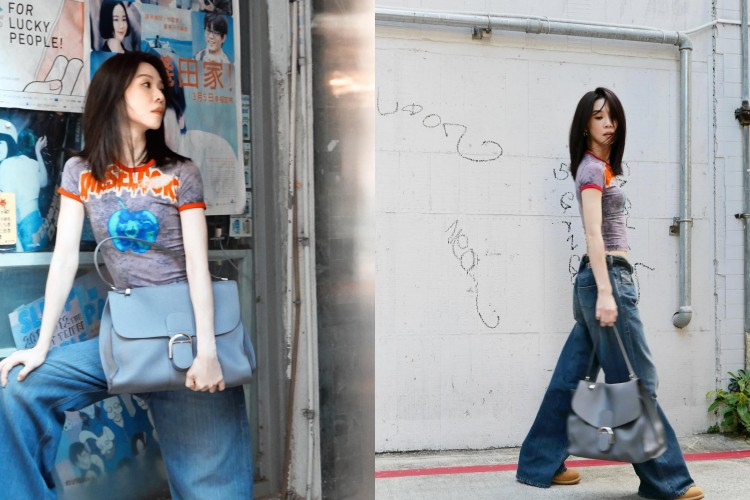 謝盈萱以一身輕鬆又不失氣場的造型展現不一樣的減齡穿搭，以短版印花上衣勾勒出俐落比例，橘紅滾邊點亮臉色，讓整體更顯活力。