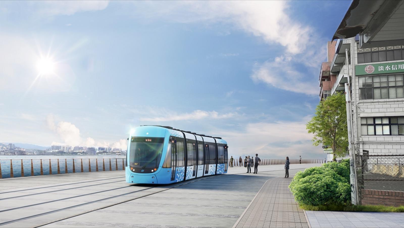 近日，新北市政府釋出「淡海輕軌第二期河岸段模擬圖」，旨在提供淡海新市鎮綠色、低碳及便利的公共運輸，改善淡水既有交通壅塞，並提升觀光與遊憩品質。整體視覺以水藍色為主，搭配鮮明黑色對比，沿河岸與人行道穿梭，呈現詩意的景觀效果。